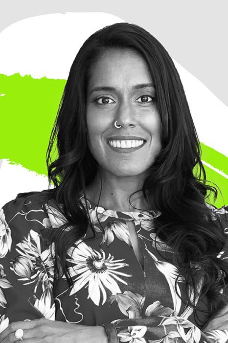 Ritu Bhasin surrounded by colorful graphic designs