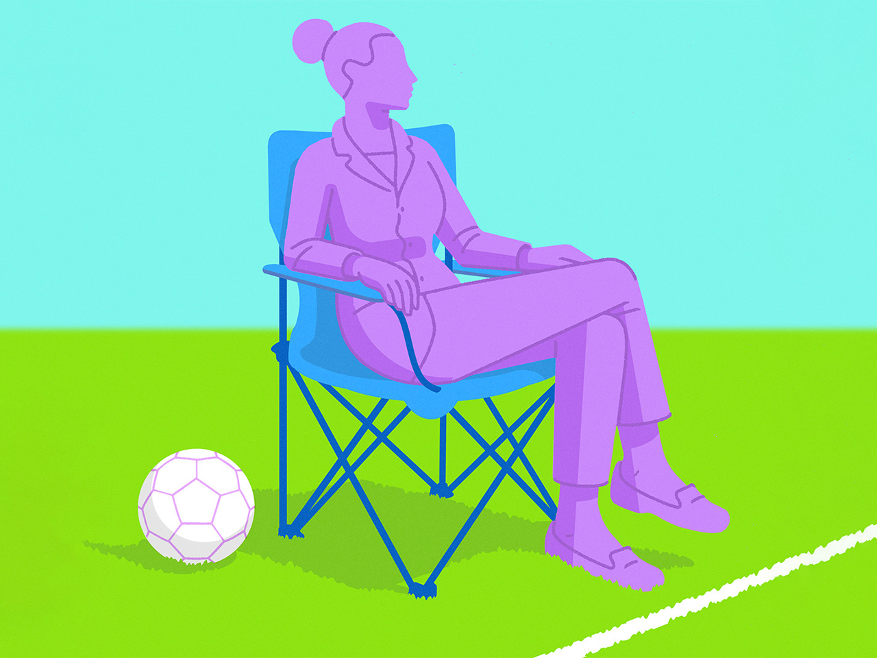 A woman in work clothes sitting on the sidelines, next to a soccer ball.