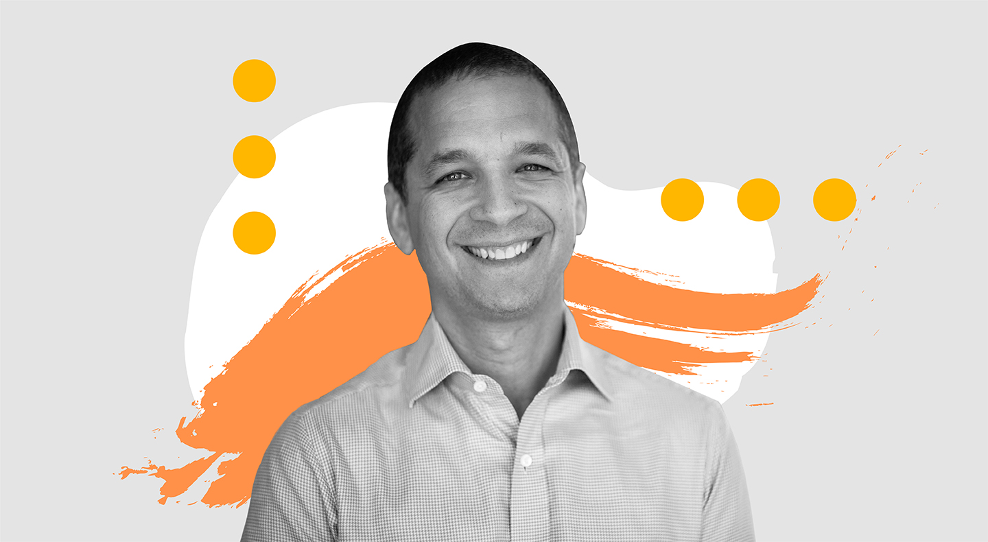 LinkedIn’s Daniel Roth surrounded by colorful graphic designs