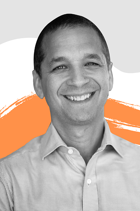 LinkedIn’s Daniel Roth surrounded by colorful graphic designs