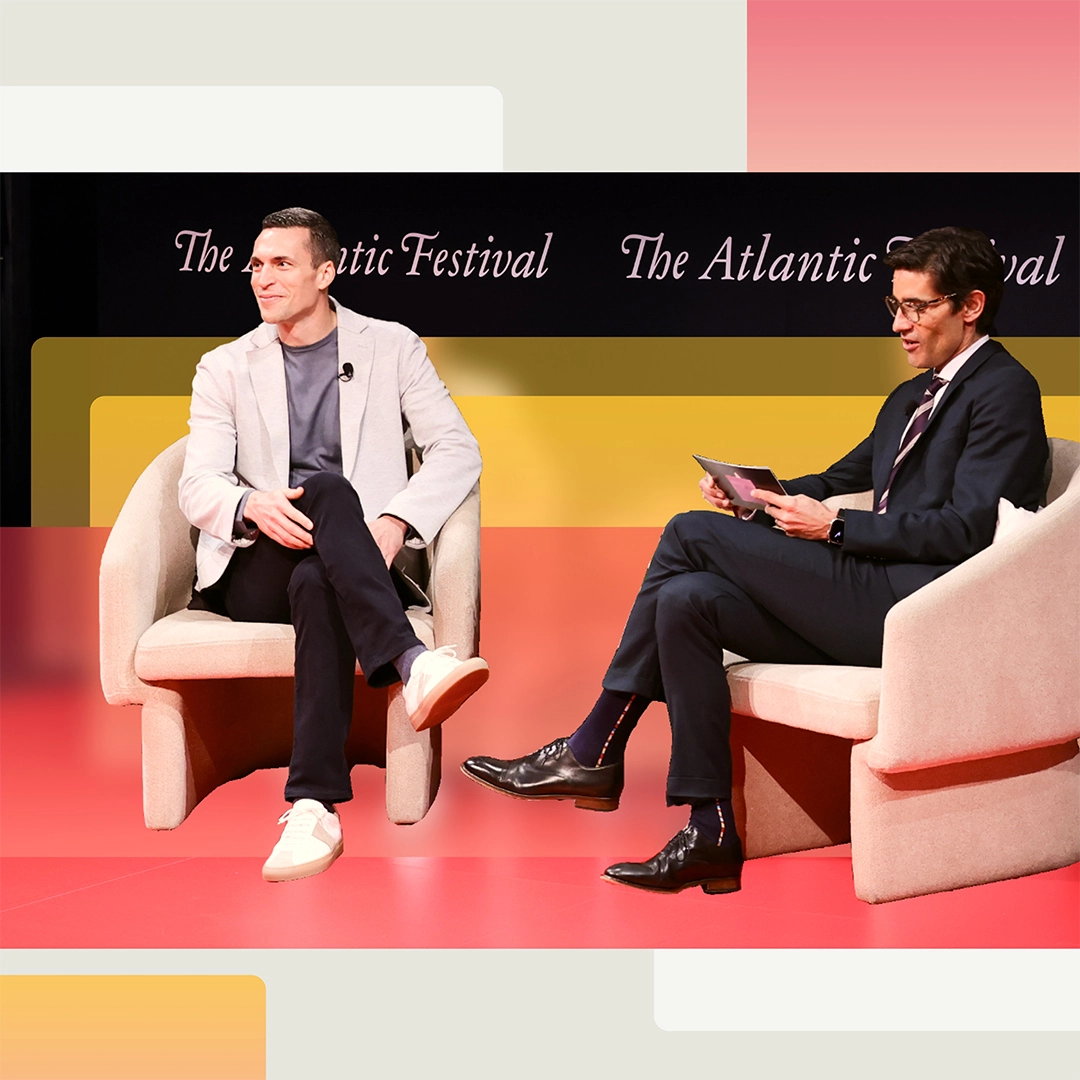 A photograph of Microsoft’s Jared Spataro onstage at The Atlantic Festival with Nicholas Thompson, CEO of The Atlantic