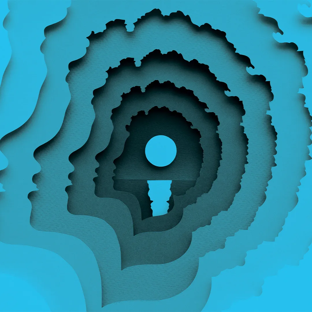 Abstract layered paper cut art of a head with a circular opening, in shades of blue.